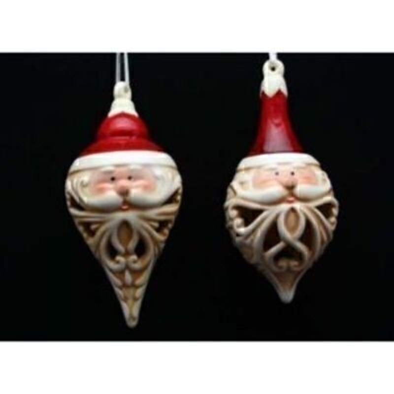 Gorgeous ceramic Santa filigree hanging Christmas tree decorations by the designer Gisela Graham. A beautiful addition to your festive Christmas Tree decorations to suit a traditional Christmas theme. This is for the set of Father Christmas Tree Decorations by Gisela Graham one of each style. Size 14x6cm<br><br>
If it is Christmas Tree Decorations to be sent anywhere in the UK you are after than look no further than Booker Flowers and Gifts Liverpool UK. Our Tree Decorations are specially selected from across a range of suppliers. This way we can bring you the very best of what is available in Tree Decorations.<br><br>
Here at Booker Flowers and Gifts we love Christmas and as such we have a massive range of traditional and contemporary Christmas Decorations.<br><br>

Gisela loves Christmas Gisela Graham Limited is one of Europes leading giftware design companies. Gisela made her name designing exquisite Christmas and Easter decorations. However she has now turned her creative design skills to designing pretty things for your kitchen, home and garden. She has a massive range of over 4500 products of which Gisela is personally involved in the design and selection of. In their own words Gisela Graham Limited are about marking special occasions and celebrations. Such as Christmas, Easter, Halloween, birthday, Mothers Day, Fathers Day, Valentines Day, Weddings Christenings, Parties, New Babies. All those occasions which make life special are beautifully celebrated by Gisela Graham Limited.<br><br>
Christmas and her love of this occasion is what made her company Gisela Graham Limited come to fruition. Every year she introduces completely new Christmas Collections with Unique Christmas decorations. Gisela Grahams Christmas ranges appeal to all ages and pockets.<br><br>
Gisela Graham Christmas Tee Decorations are second not none a really large collection of very beautiful items she is especially famous for her Fairies and Nativity. If it is really beautiful and charming Christmas Decorations you are looking for think no further than Gisela Graham.<br><br>
This pair of Gisela Graham Father Christmas / Santa Christmas Tree Decorations are a great choice and are sure to be a favorite for years to come. Remember Booker Flowers and Gifts for Gisela Graham Tree Decorations that can be send anywhere in the UK.